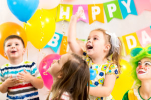 children celebrating birthday